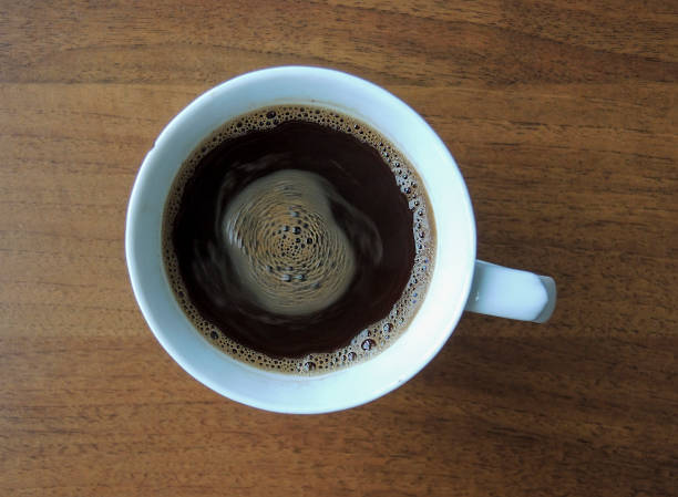 istock Full cup of coffee 988260584