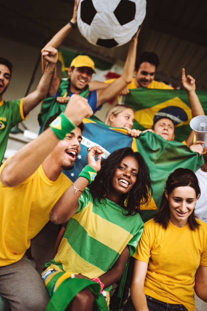 istock brazilian supporters have fun at the stadium 988273384