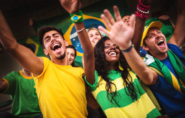 istock brazilian supporters have fun at the stadium 988274090