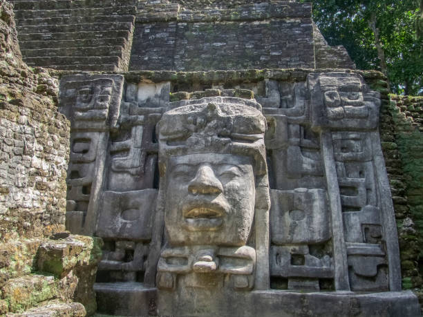 istock sculptures at Lamanai Temple in Belize 988274460