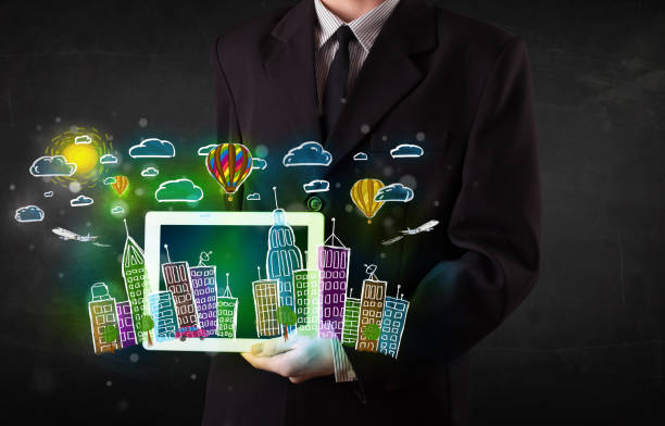 istock Young person showing tablet with hand drawn cityscape 988286500