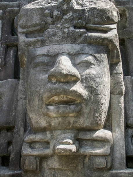 istock sculpture at Lamanai Temple in Belize 988287212