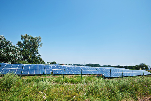 Solar Farm Behind A Fence