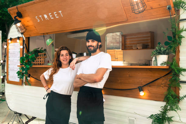 istock Young entrepreneurs Food truck 988321944