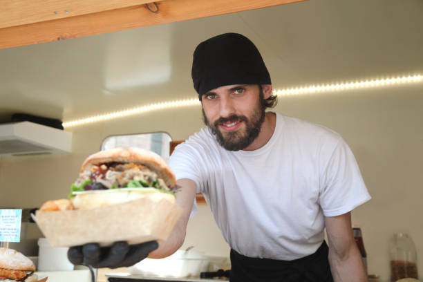 istock Young entrepreneurs Food truck 988321976