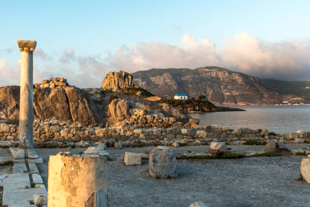 View on little island Kastri near Kos in Kamari bay, Greece at sunrise