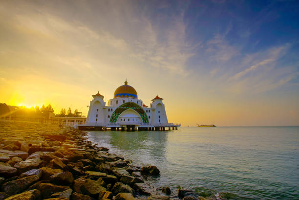 istock Majestic view of Malacca Straits Mosque during sunset 988322584