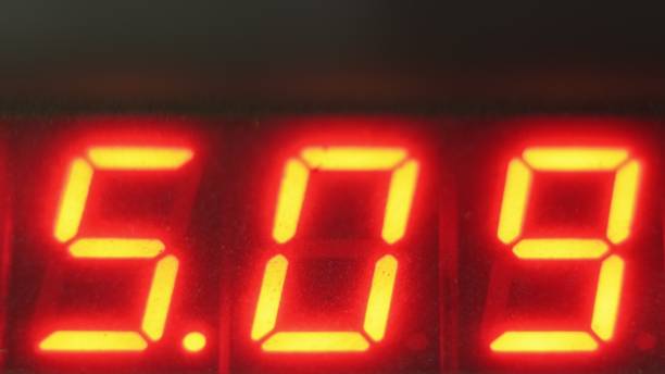 istock Electronic digital dial meter counter pipe. Manufacture of plastic water pipes factory. Process of making plastic tubes on the machine tool with the use of water and air pressure. 988330170