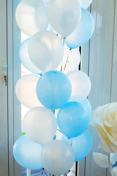 istock Blue and white balloons for little boy birthday 988332352