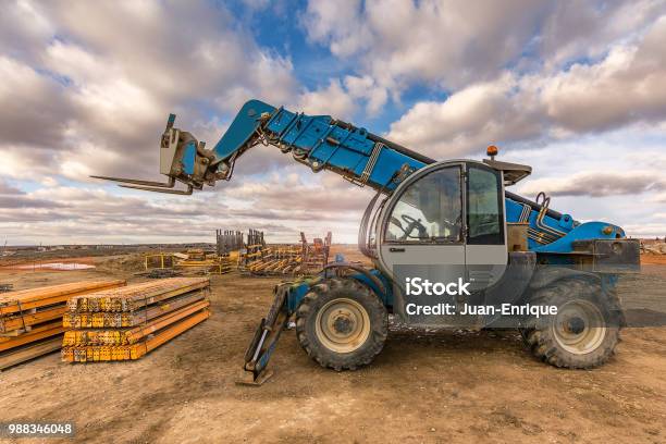 Forklifts In The Works Of The Ring Road Of Segovia In Spain Stock Photo - Download Image Now