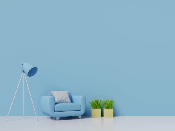 istock Modern living room interior with blue wall and blue armchair 988363676