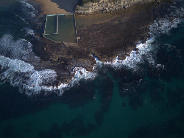 istock Aerial view of the wave on beach 988363860