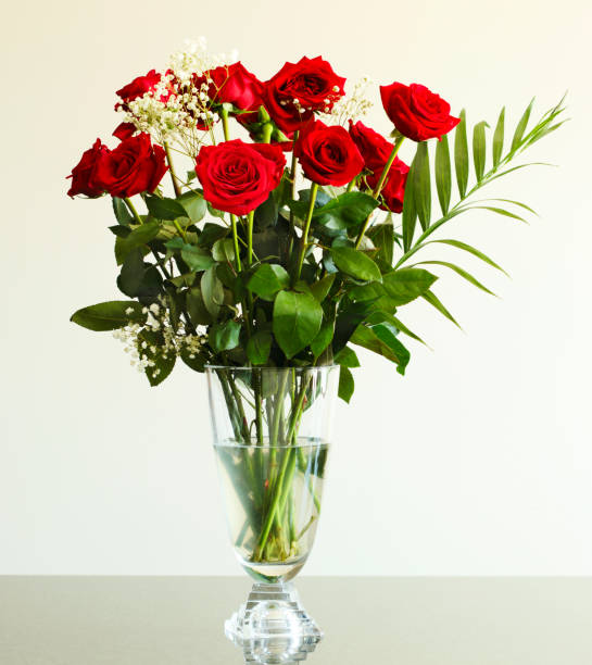 istock Bouquet of red roses on the table 988368056