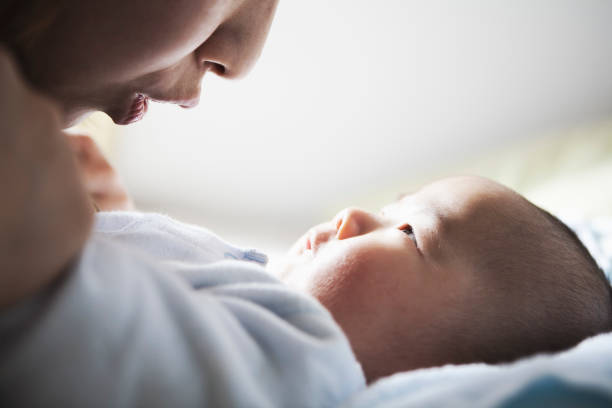 istock Mother and son communicating at home 988369614