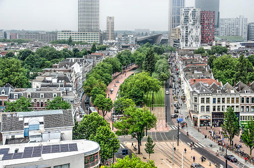 Rotterdam, The Netherlands, June 16, 2018: high angle view of Westersingel canal with at its end the characteristic shape of the new central station