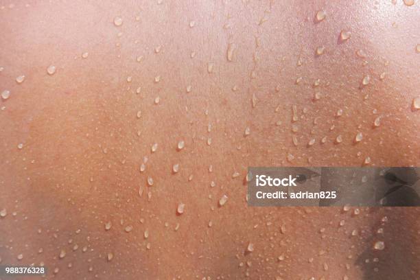 Water Drops On Woman Skin Close Up Of Wet Human Skin Texture Stock Photo - Download Image Now