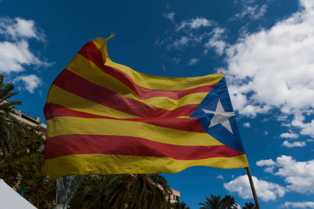 istock Senyera -Catalan separatists flag against sky 988412030