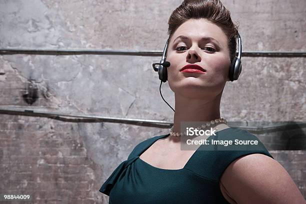 Woman In Warehouse Stock Photo - Download Image Now - 1950-1959, Telephone, Adult