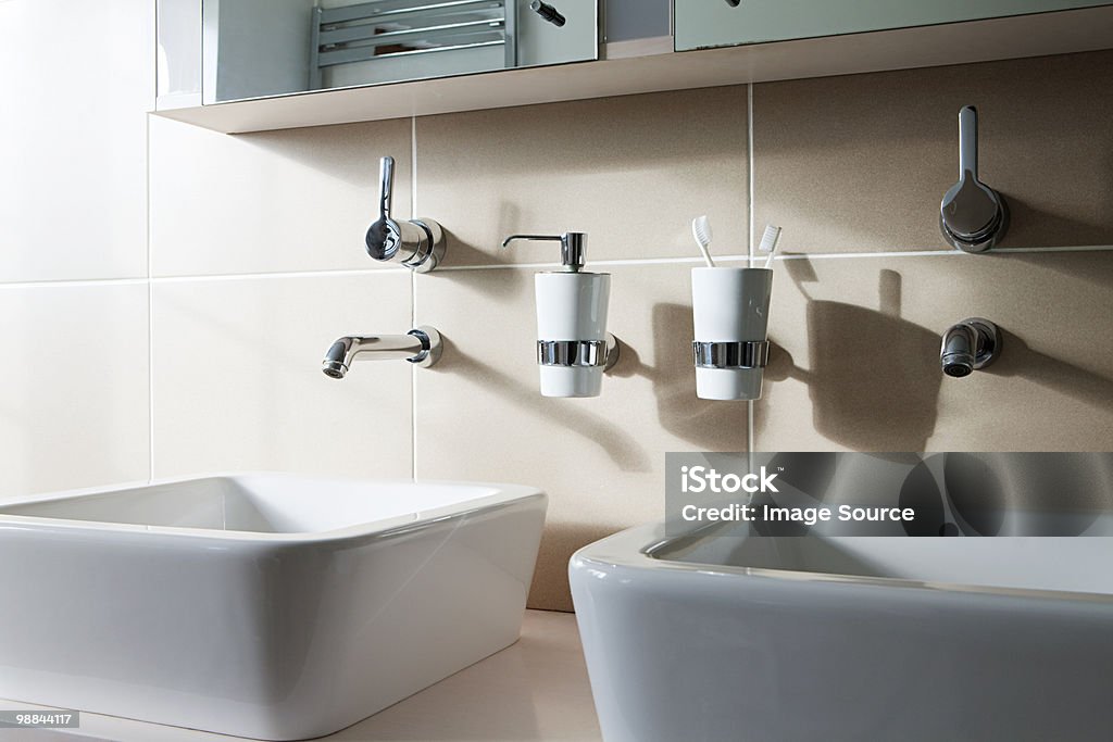 Two sinks  Toothbrush Holder Stock Photo