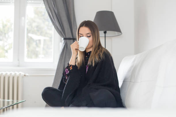 istock Young woman having a flu 988466162