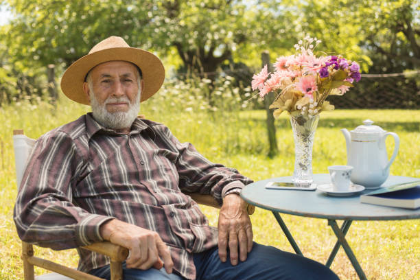 istock Senior Man at the Garden 988467252