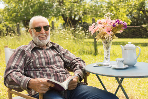 istock Senior Man at the Garden 988467262