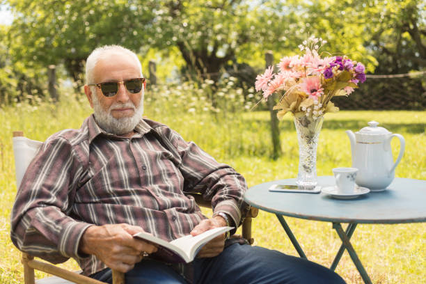 istock Senior Man at the Garden 988467288