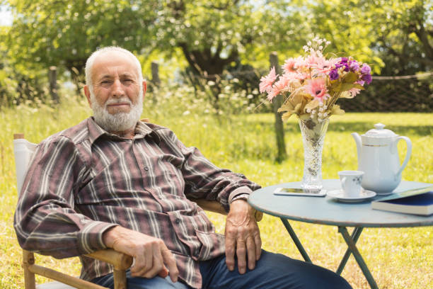 istock Senior Man at the Garden 988467536