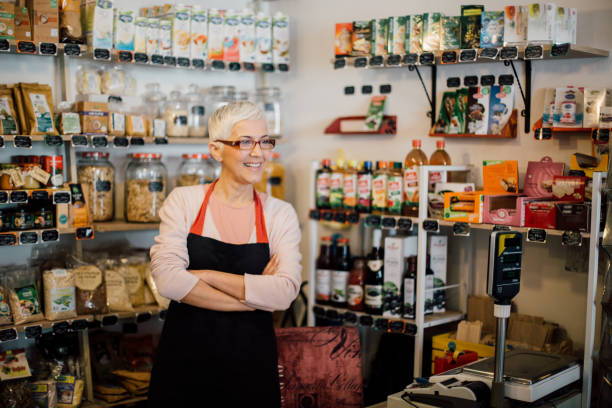istock Happy sales woman with hands clasped at work 988478678