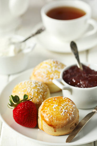 istock English scones with jam and whipped cream 988480906