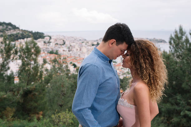 istock Couple in love overlooking the city 988495664