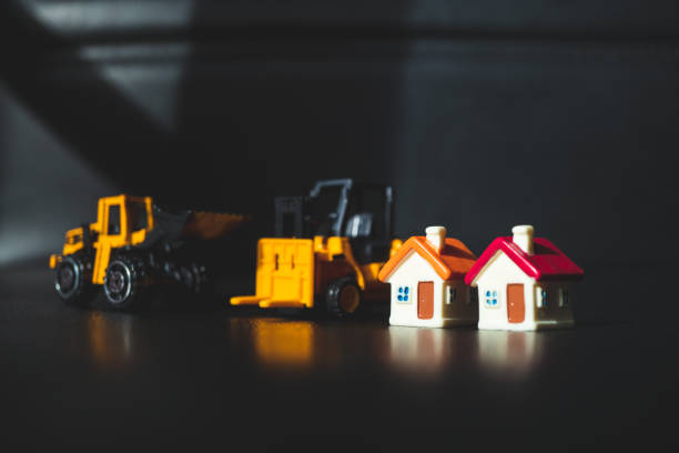 istock Miniature house and transportation vehicle 988507450