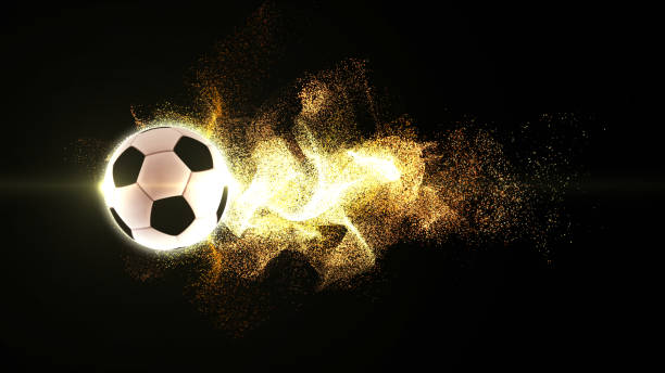 istock Spinning Football with Flowing Fire Particles 988524980