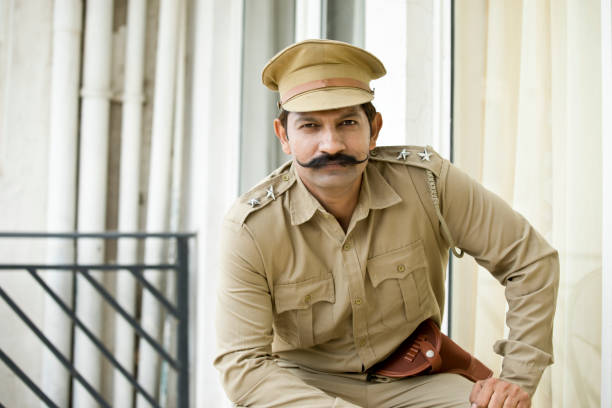 Portrait of Indian police man in uniform