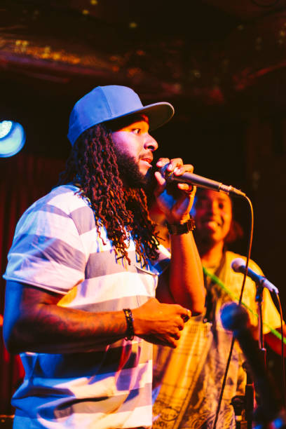 istock Male singer singing at stage 988539776