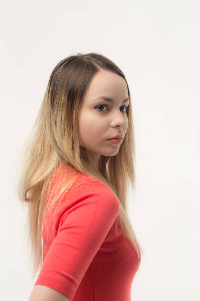 istock girl in a red dress 988541170