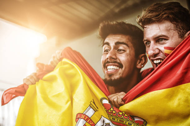 istock spanish supporter with the megaphone 988546424