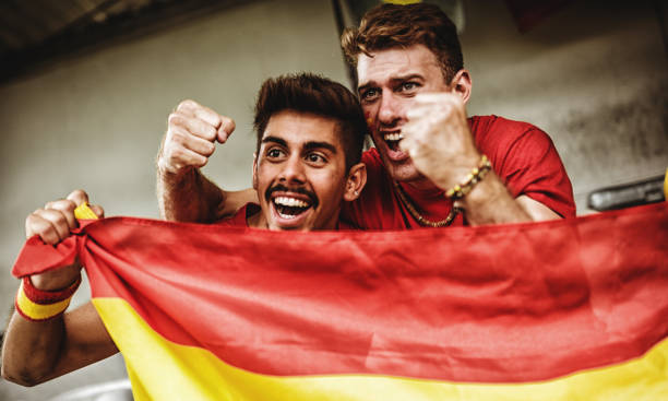 istock spanish supporter with the megaphone 988546932