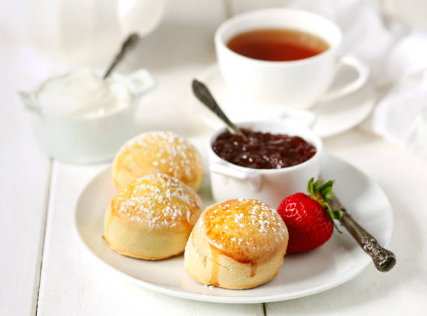 istock English scones with jam and whipped cream 988552632