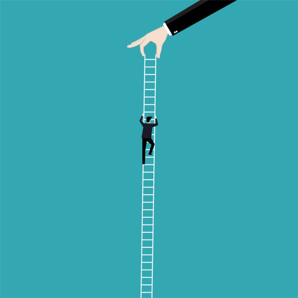istock Businessman climbing on staircase up to success 988584854