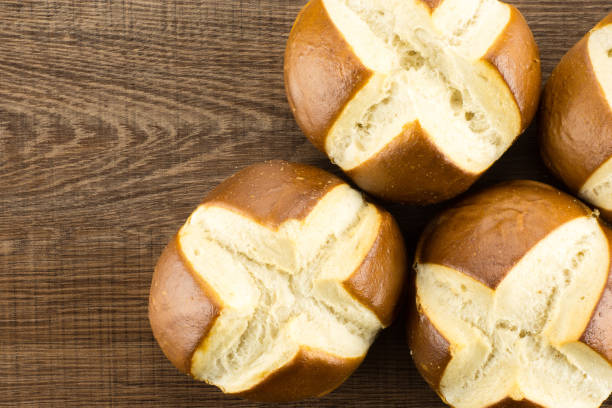Fresh Bavarian bread bun on brown wood