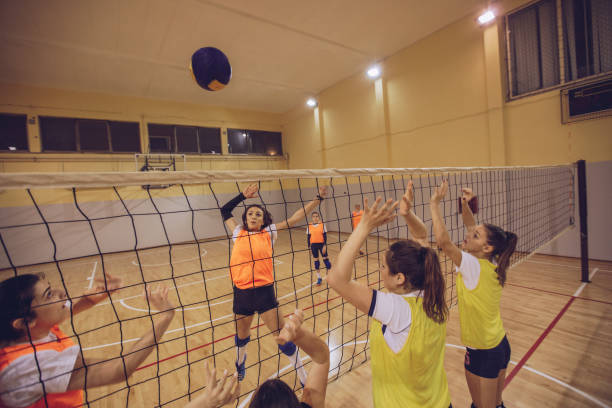 istock Women playing volleyball 988618284