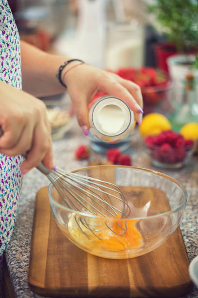 istock Woman Preparing Pancakes 988634788