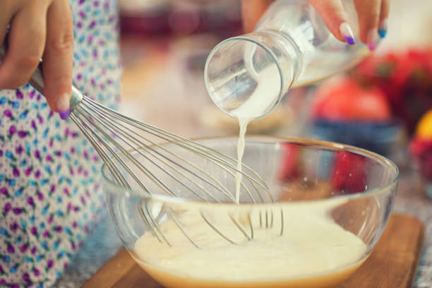 istock Woman Preparing Pancakes 988635994