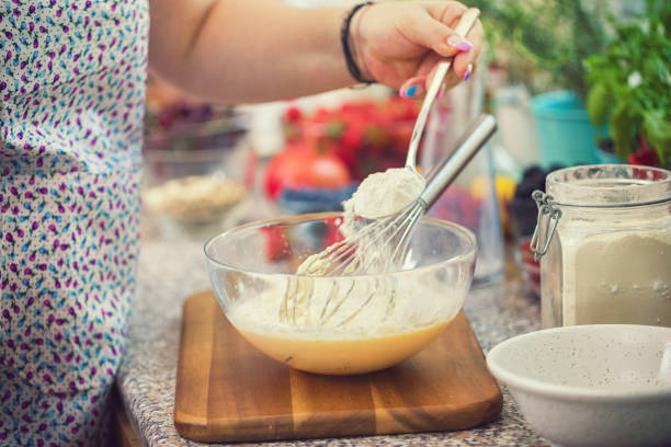 istock Woman Preparing Pancakes 988636182
