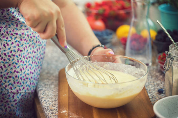 istock Woman Preparing Pancakes 988637068