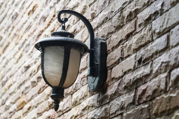 istock old antique vintage outdoor lamp light on brick wall 988638354