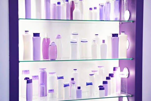 Showcase shop with plastic bottles and jars cosmetic and shampoo
