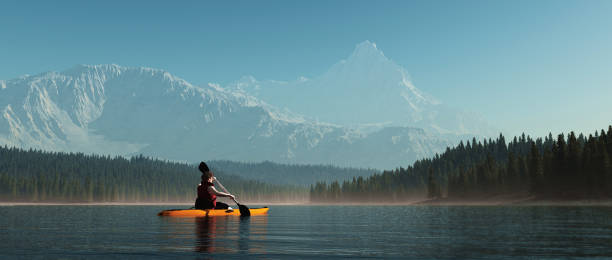 istock Man with canoe on the lake. 988644226