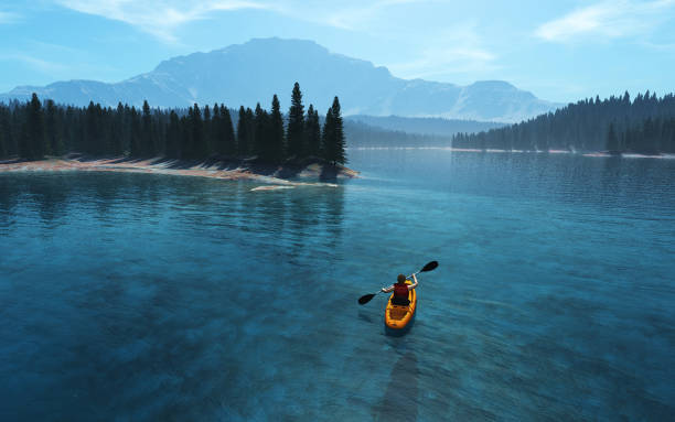 istock Man with canoe on the lake. 988644270